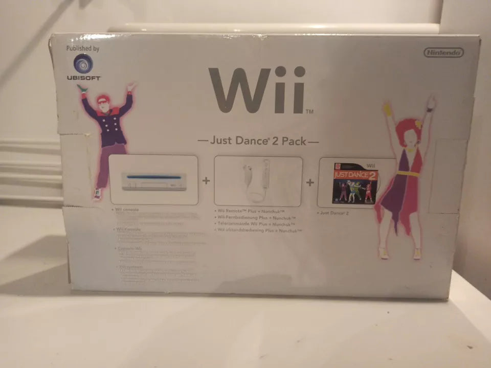 Console Wii Pack Just Danse 2 en boite avec cale et notice trés bonne état pal